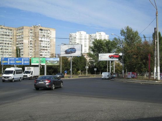 Фото рекламної площини за адресою просп. Академика Глушко, 29-А / просп. Маршала Жукова (призма)