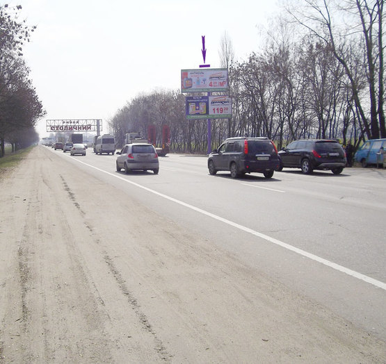 Фото рекламной плоскости по адресу Кольцевая дорога, 200 м до въезда на рынок "Столичный"(верхняя пл.)