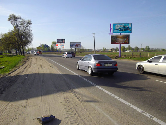 Фото рекламной плоскости по адресу Кольцевая дорога,напротив центрального входа на рынок автозапчастей "Жуляны"(нижняя пл.)