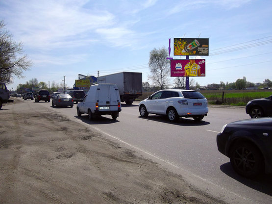 Фото рекламной плоскости по адресу Кольцевая дорога,200м-до гостиницы "Нотеl",напртив рынка  а\з "Жуляны"(нижняя пл.)