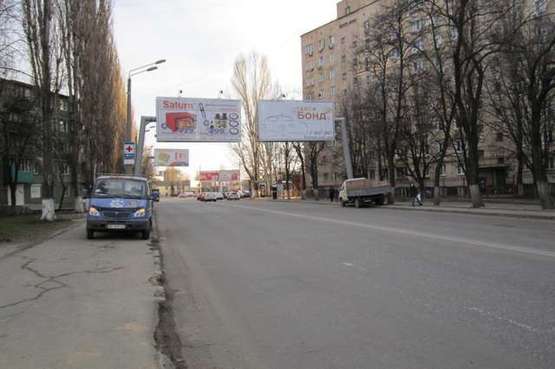 Фото рекламної площини за адресою ул. Краснова, 14 - пл. Толбухина (из города правый Призма)