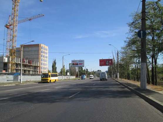 Фото рекламной плоскости по адресу Николаевская дор. 303 (напротив) (Лузановка) (напротив) (з міста права Призма)