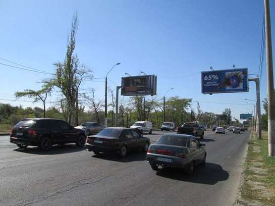 Фото рекламной плоскости по адресу Николаевская дор. 303 (напротив) (Лузановка) (в місто ліва Призма)
