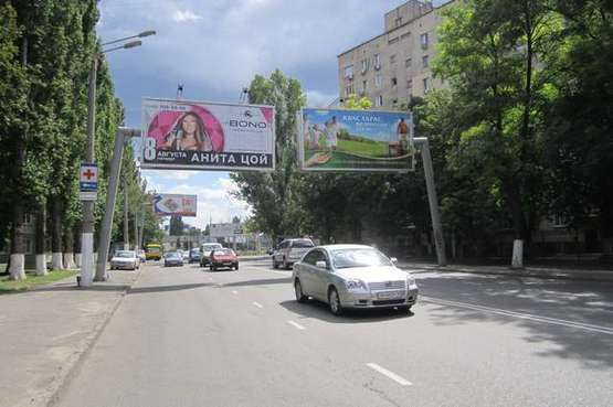 Фото рекламної площини за адресою ул. Краснова, 14 - пл. Толбухина (из города левый Призма)