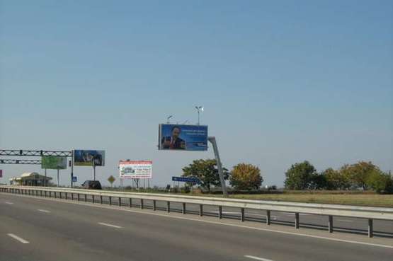 Фото рекламної площини за адресою Овидиопольская дор. - 7-й км (из города Призма)