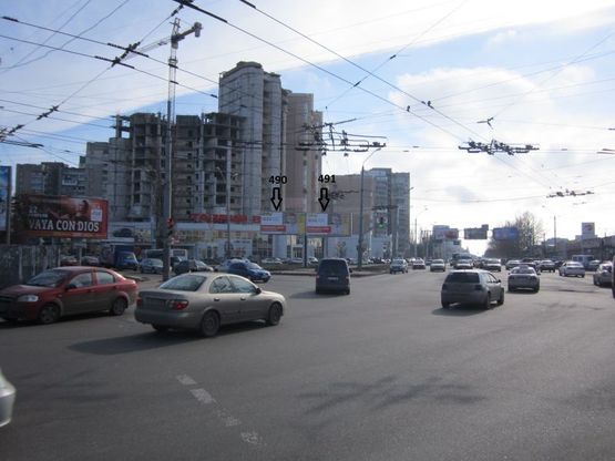 Фото рекламной плоскости по адресу просп. Маршала Жукова - ул. 25-й Чапаевской дивизии (призма правая)