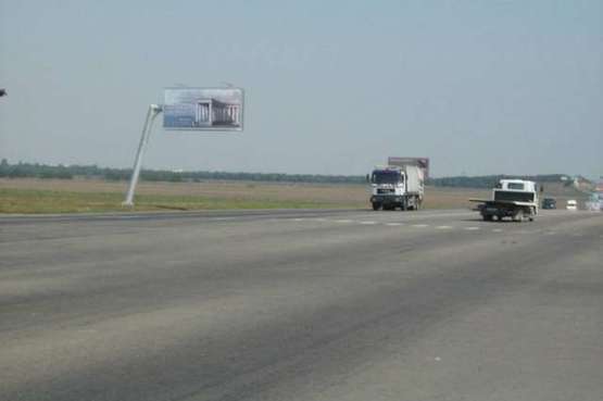 Фото рекламної площини за адресою Овидиопольская дор. - 7-й км (в город Призма)