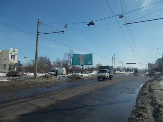 Фото рекламної площини за адресою Героев Крут ул. (Черепина ул), 36, (мебел.салон "Статус", "Эко-Маркет", АЗС "ANP", салон "Ssang Yong","Chery"), в направл. ул. Замостянской