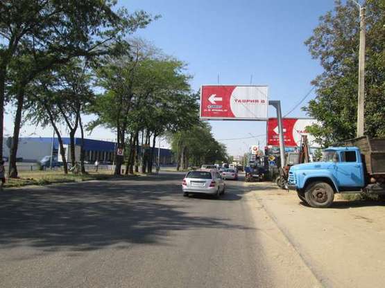 Фото рекламной плоскости по адресу ул. Академика Вильямса, 82 (возле Метро) (призма)