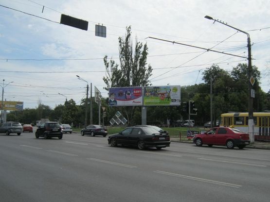 Фото рекламной плоскости по адресу Николаевская дорога - Южная дорога (Призма левая)