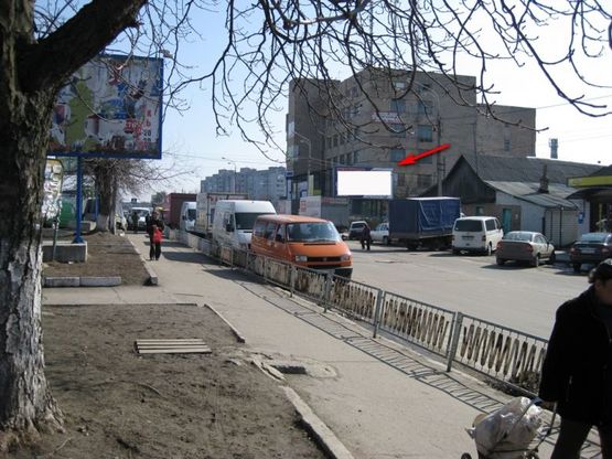 Фото рекламной плоскости по адресу ул. Домбровского 34 ( Рынок "Сенный")