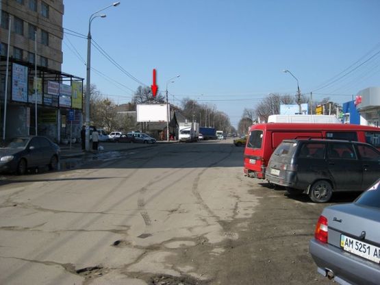 Фото рекламной плоскости по адресу ул. Домбровского 34 ( Рынок "Сенный")