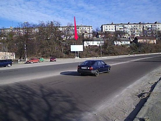 Фото рекламной плоскости по адресу ул. Жуйка 10 (въезд с Бердичева)