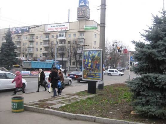 Фото рекламной плоскости по адресу пл. Победы №1 (Остановка, м-н Темп)