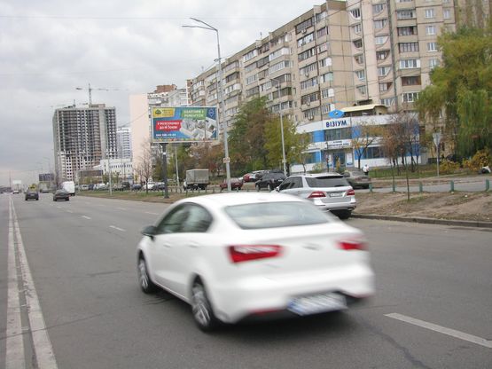Фото рекламной плоскости по адресу Ревуцького вул., 30/1/вул. Олійника у напрямку ст.м. Харківська