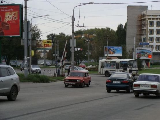 Фото рекламной плоскости по адресу Вул.Бородинська-вул.Гребельна -вул.Тиражная обличчям на Гребельну