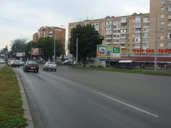 Фото рекламной плоскости по адресу на перер. ул. Фрунзе и ул. Розы Люксембург