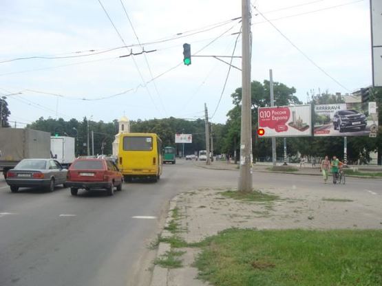 Фото рекламной плоскости по адресу на перкр.ул.Фрунзе и ул.Кагамлыка