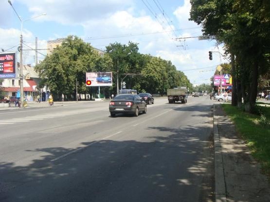 Фото рекламной плоскости по адресу на перкр. ул. Фрунзе,58 и ул.О.Вишни