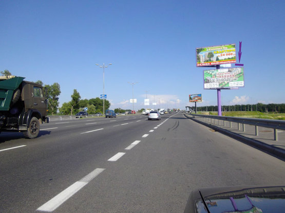 Фото рекламной плоскости по адресу Кольцевая дорога, Жулянский путепровод. направл. на Одесскую пл. (нижняя пл.)