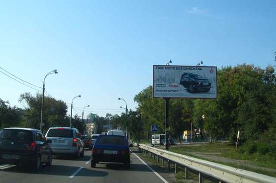 Фото рекламної площини за адресою Шевченка Тараса пл., : Мінське шосе; навпроти автостоянки "Полісся" (в напр. пл.Шевченко)