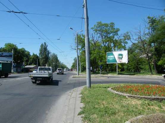 Фото рекламної площини за адресою Іванівський міст - Овідіопільська дорога - Щорса вул. (призма)