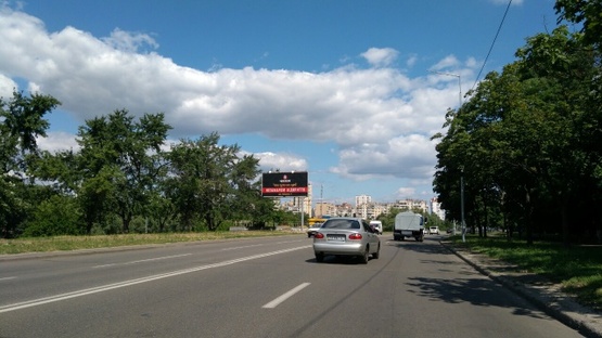 Фото рекламной плоскости по адресу Райдужна, 9 навпроти