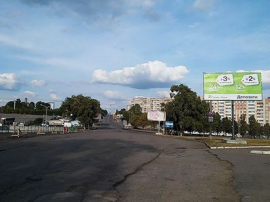 Фото рекламной плоскости по адресу Млынивська ул., (напротив авторынка, АЗС "Укрнафта")