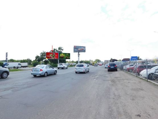 Фото рекламної площини за адресою Кольцевая дорога, на светофоре, рядом Гостиница, от МЕТRО к Жулян, левый