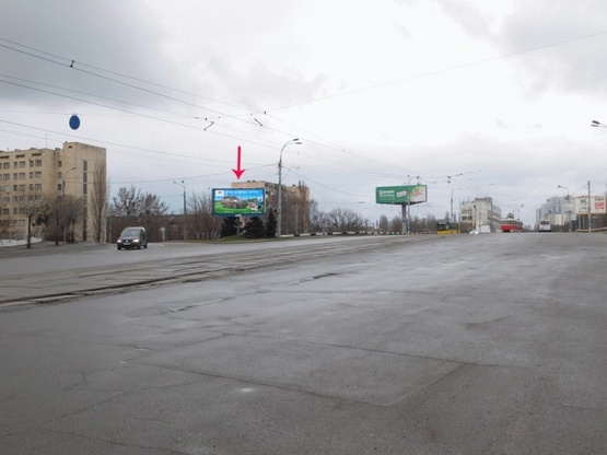Фото рекламной плоскости по адресу Дегтяревская ул., возле ул.Довженко, развязка, из центра
