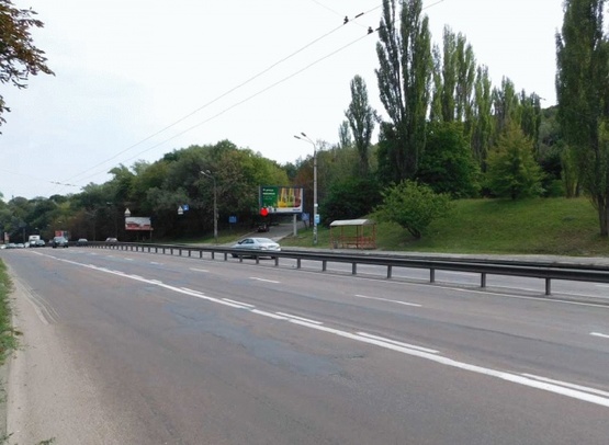 Фото рекламной плоскости по адресу Телиги Е.ул., от ст. метро "Дорогожичи" в сторону ул. Фрунзе, напротив АЗС