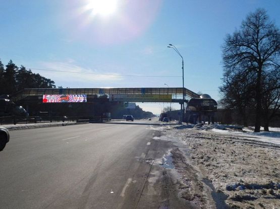 Фото рекламної площини за адресою Броварской пр-т, пешеходный мост около птицефабрики