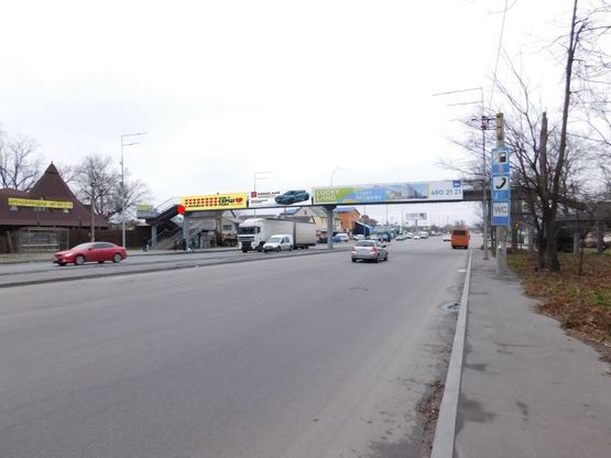 Фото рекламної площини за адресою Городская ул., пешеходный мост около ул. Синеозерной