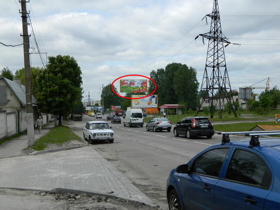 Фото рекламной плоскости по адресу Вашингтона  за поворотом з Зеленої К 2 А верх. ТЦ МЕТРО