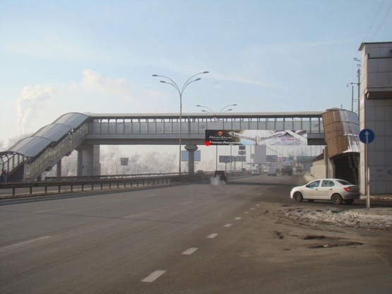 Фото рекламной плоскости по адресу Дарницкое шоссе, переход возле ж/д станции "Левый берег", 2,4*16 м, направление в центр