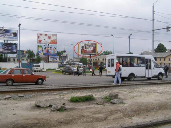 Фото рекламной плоскости по адресу Городоцька К9  ( напроти привокзального ринку, до центру)