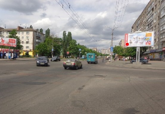 Фото рекламної площини за адресою Рокосовского ул., 10 - Защитников Украины ул., 1