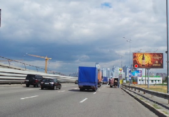 Фото рекламной плоскости по адресу Бажана пр., съезд с Южного моста