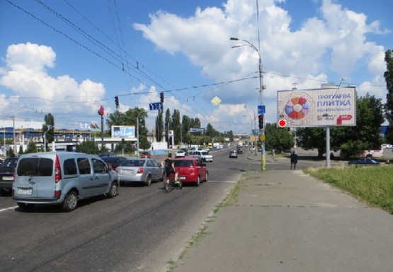 Фото рекламної площини за адресою Луговая ул., 9 - Семьи Кульженков ул. (бывш. Дегтяренко П. ул.)