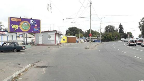 Фото рекламної площини за адресою Львівське шосе (автостоянка біля ринку) нижній Б