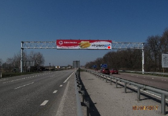 Фото рекламной плоскости по адресу Трасса M-03, Киев - Харьков, 127,050