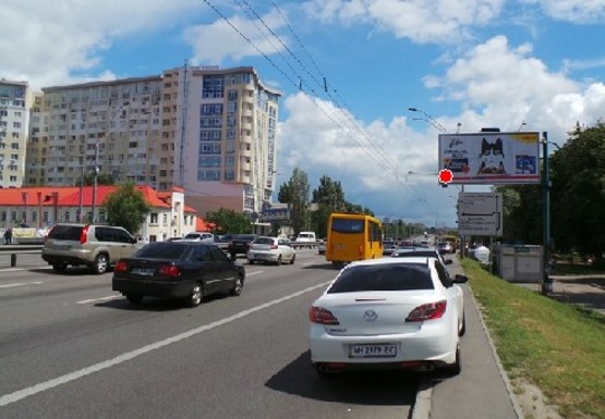 Фото рекламної площини за адресою Победы пр., 73/1