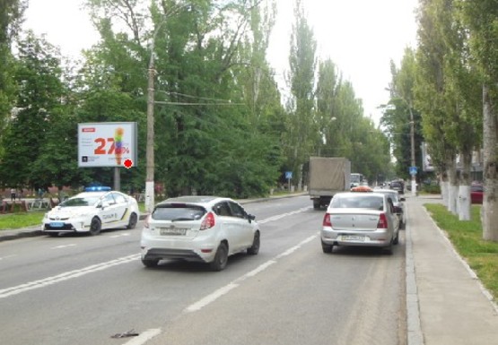 Фото рекламной плоскости по адресу Ушакова пр, 60 напротив (BackLit)