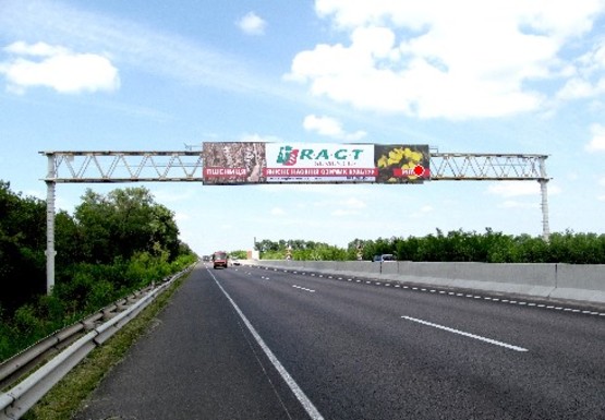 Фото рекламной плоскости по адресу Трасса M-03, Киев - Харьков, 76,800