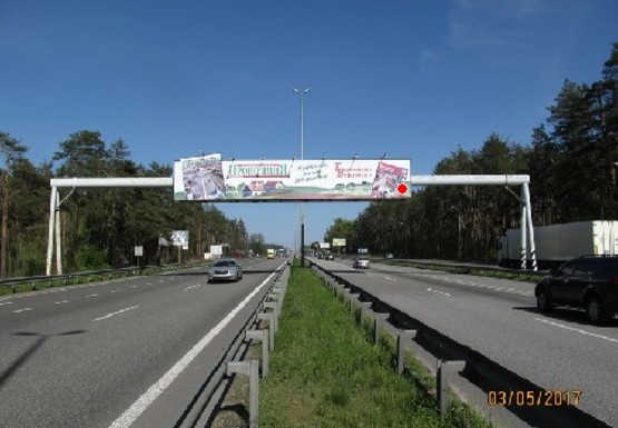 Фото рекламной плоскости по адресу Трасса M-06, Киев-Житомир, 36,500 (3 месяца минимальный срок размещения)