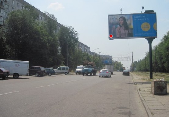 Фото рекламної площини за адресою Моторостроителей ул. - Красная ул.