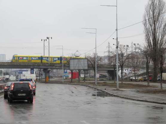 Фото рекламної площини за адресою Шухевича Романа просп. (Генерала Ватутіна просп.), 32, навпроти