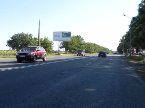 Фото рекламной плоскости по адресу Одесса - Николаев 21+520 Б