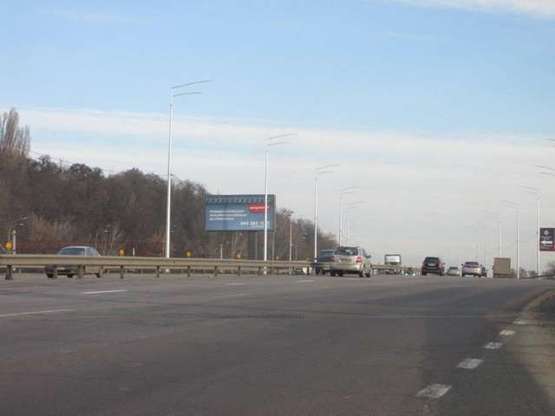 Фото рекламной плоскости по адресу Наддніпрянське шосе, "Видубичі" (в напрямку мосту Патона)