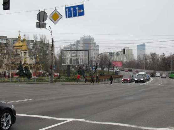 Фото рекламной плоскости по адресу Харківське шосе - Привокзальна вул.